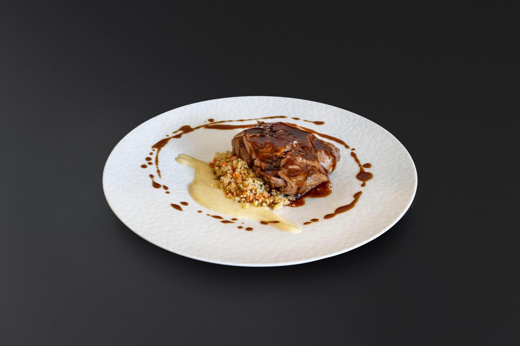 Aurea Washington Irving By Eurostars Hotel Company Granada Luaran gambar A plate of braised lamb